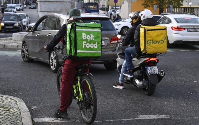 Кабмин одобрил новые налоги на доходы от Uber, Glovo и других платформ: что изменится