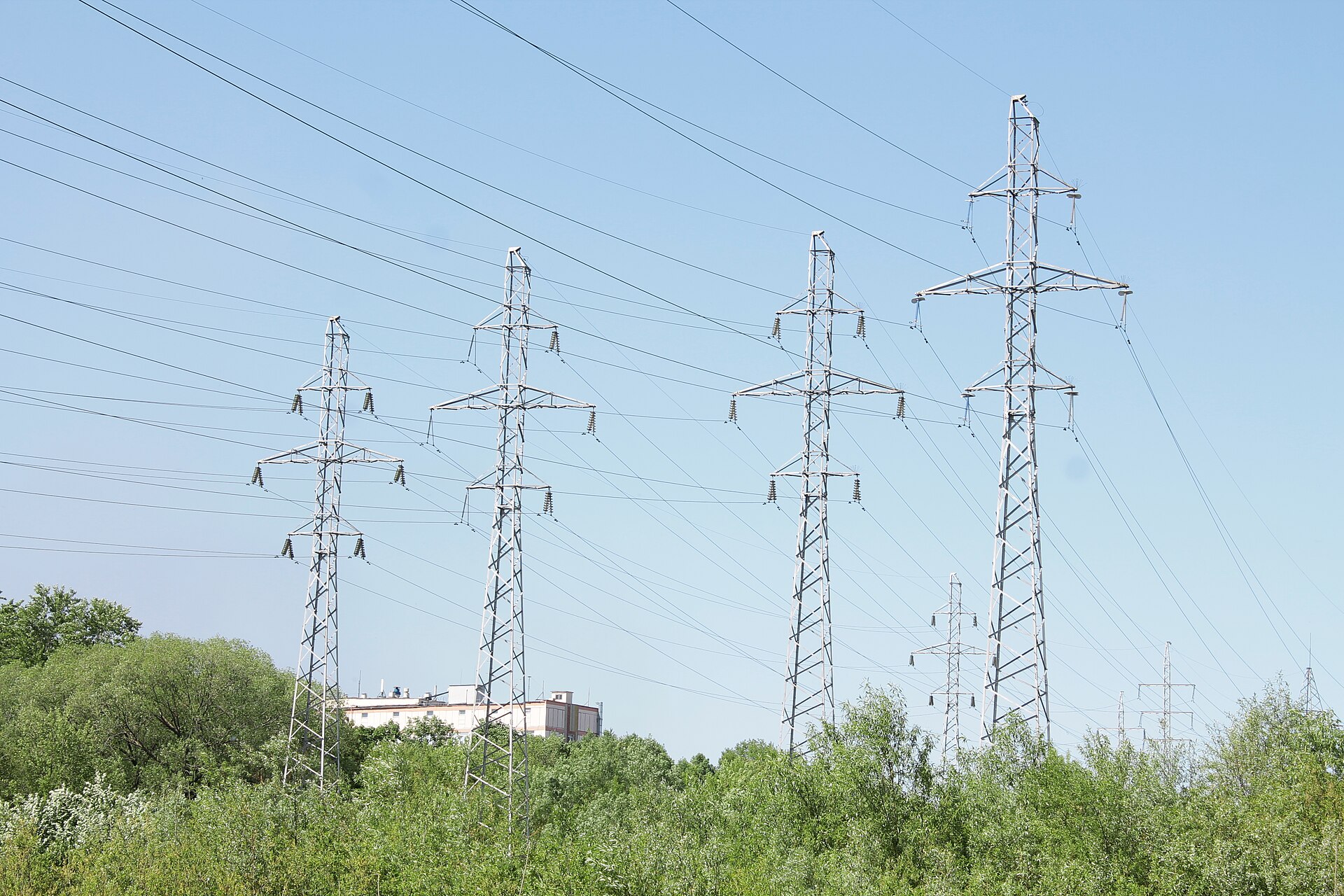 freight train; power transmission towers