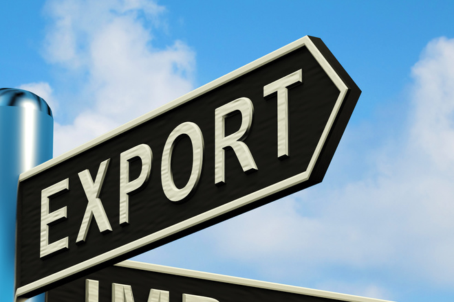 Export Or Import Directions On A Metal Signpost