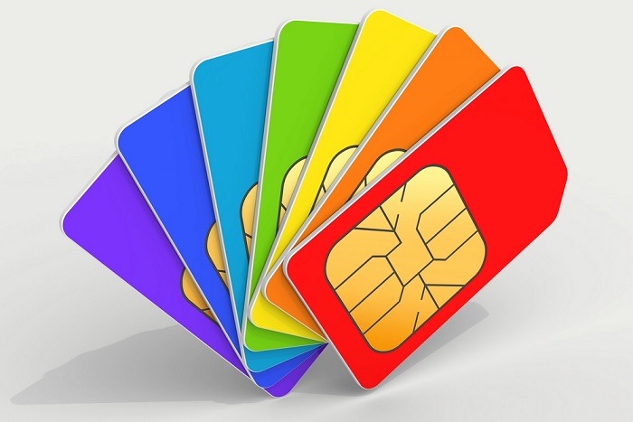 Colorful phone SIM cards in a deck above light gray background. 3d render illustration