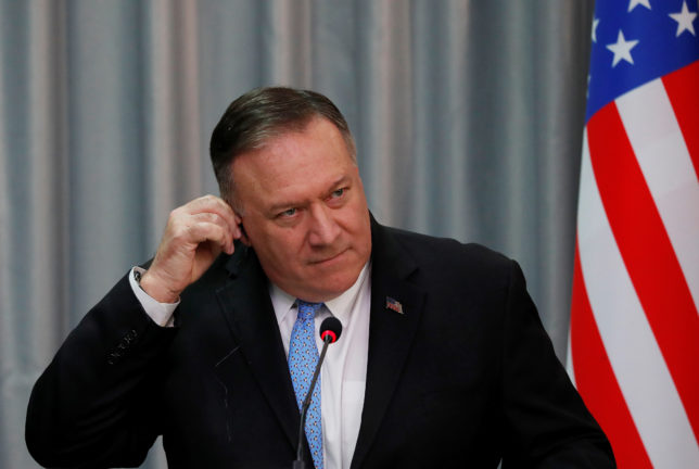 U.S. Secretary of State Mike Pompeo adjusts his earphone during a joint news conference with Belarusian Foreign Minister Vladimir Makei in Minsk, Belarus, February 1, 2020., Image: 495905414, License: Rights-managed, Restrictions: , Model Release: no, Credit line: VASILY FEDOSENKO / Reuters / Forum