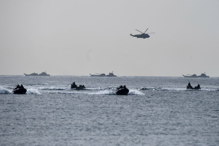 Spanish Navy Marines conduct vessels as they approach the beach during a military exercise in the Garrucha beach near Almeria, Spain, Tuesday, Oct. 21, 2014. NATO warships are exercising in the Mediterranean Sea and Atlantic Ocean as part of a NATO Response Force training to test its crisis response capabilities with over 23 warships. The exercises tests the levels of readiness for rapid response to any NATO contingency involving more than 5,000 military and naval personnel from 14 NATO nations: Belgium, Canada, France, Germany , Greece, Italy, the Netherlands, Norway, Poland, Portugal, Spain, Turkey, the United Kingdom and the United States; and 2 partner nations: Finland and Sweden. (AP Photo/Daniel Tejedor)