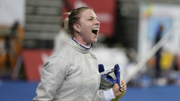 FILE - Olga Kharlan of Ukraine reacts after defeating Cyrielle Rioux of France during the women's FIE fencing sabre grand prix competition in Seoul, South Korea, Saturday, April 29, 2023. Ukraine has signaled it will no longer bar its athletes from competing against Russians who are taking part in sporting events as “neutral athletes." That would be a significant easing of its boycott policy a year before the Paris Olympics. (AP Photo/Lee Jin-man, File)